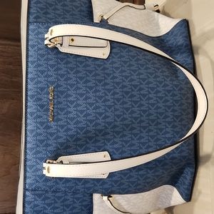 Michael Kors over the shoulder bag.  Light Blue and White